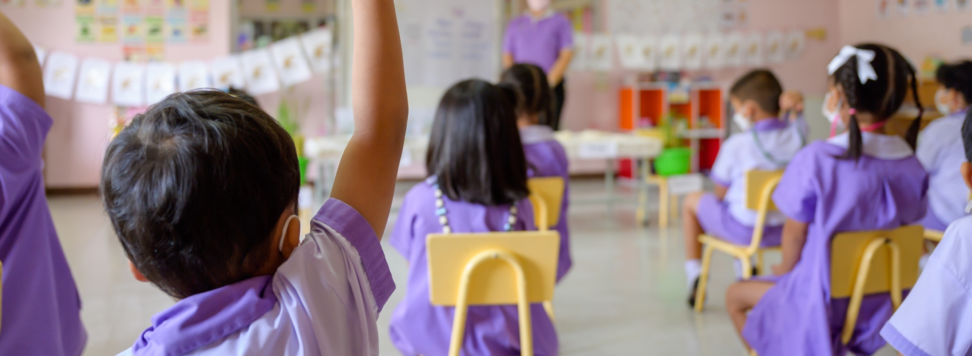 Young children sharing ideas in an early-years classroom